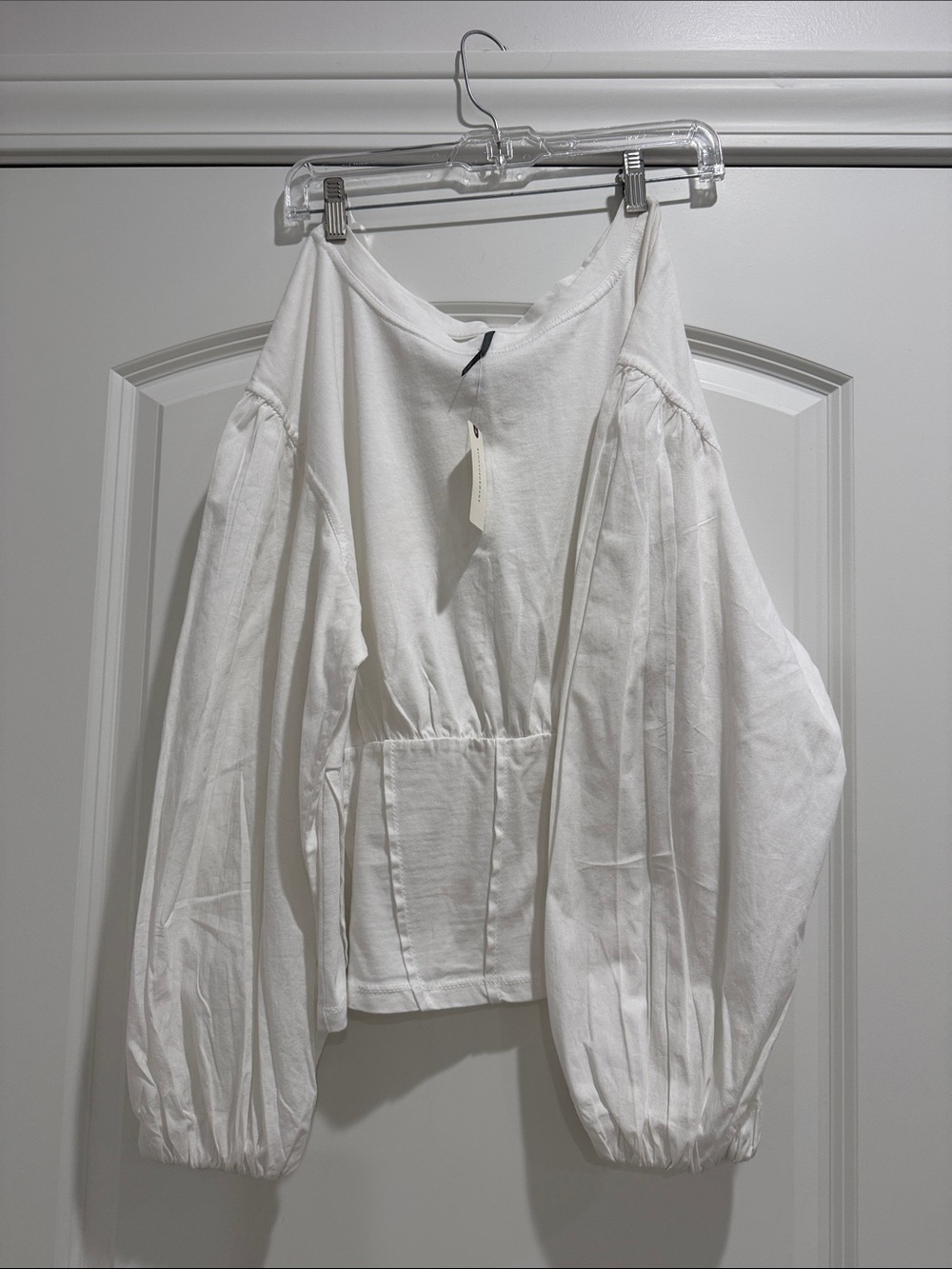 Anthro white cotton top. Balloon sleeves and tapered waist